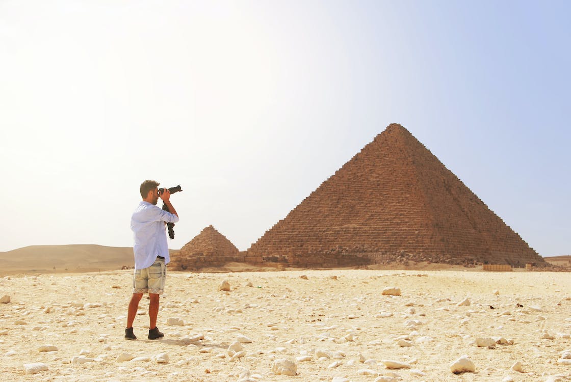 Man Taking A Picture Of The Great Pyramid